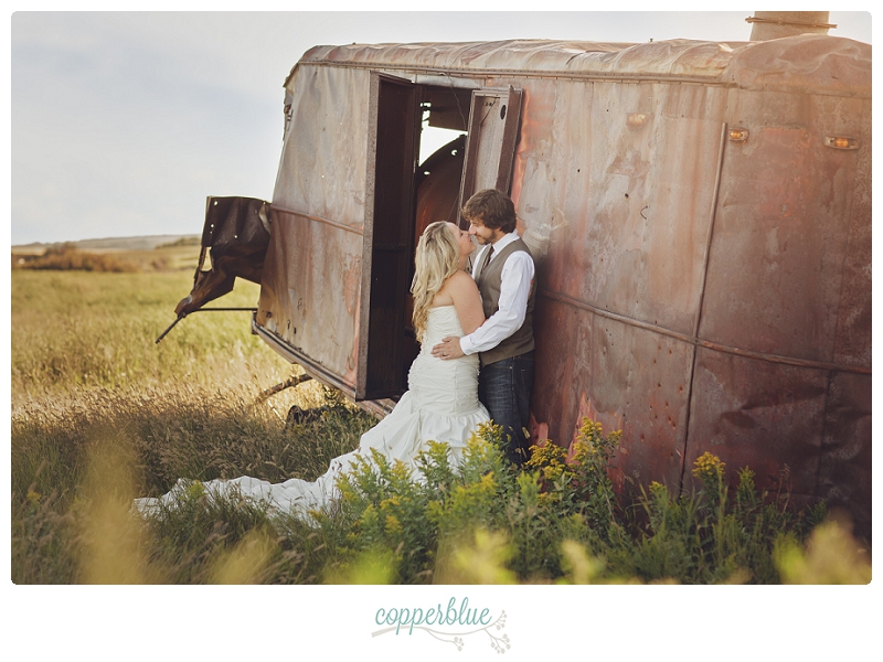 Bride and groom with abandoned train