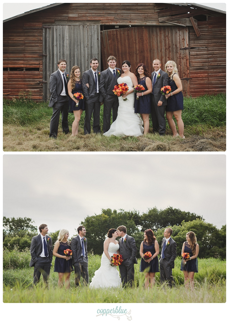 Wedding party in front of barn