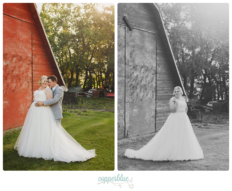 Bride and groom with red barn