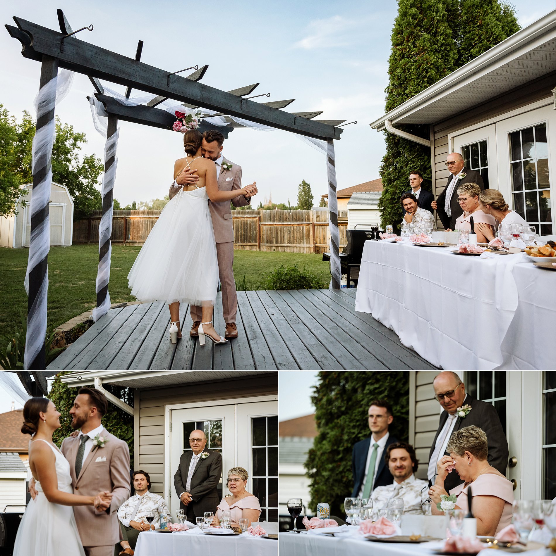 Bride and groom share an emotional first dance on the back deck at their outdoor wedding reception.