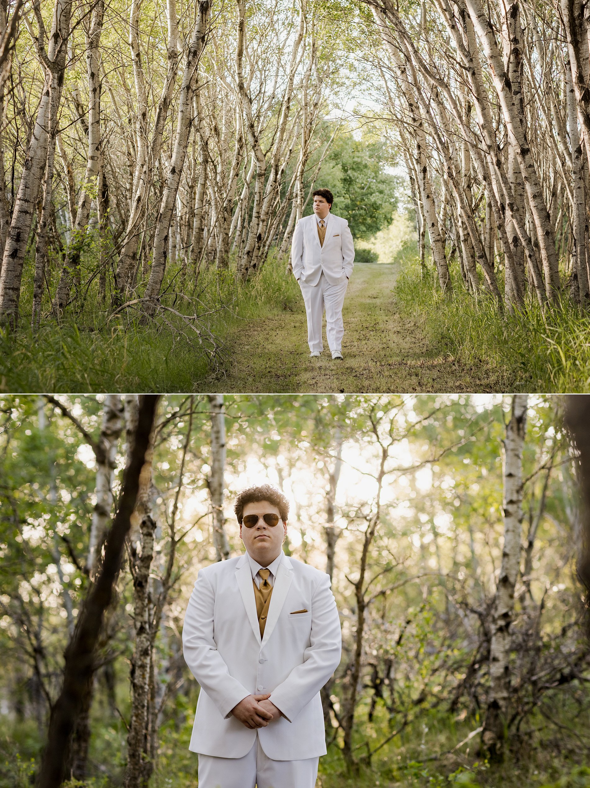 Male high school graduate in a white suit with gold accessories, standing on a path in the trees near Delisle, Saskatchewan.