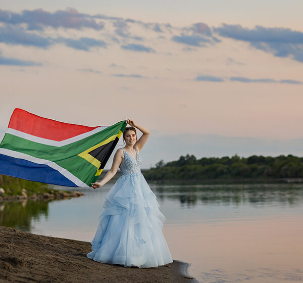 Grad photos with the South African flag.