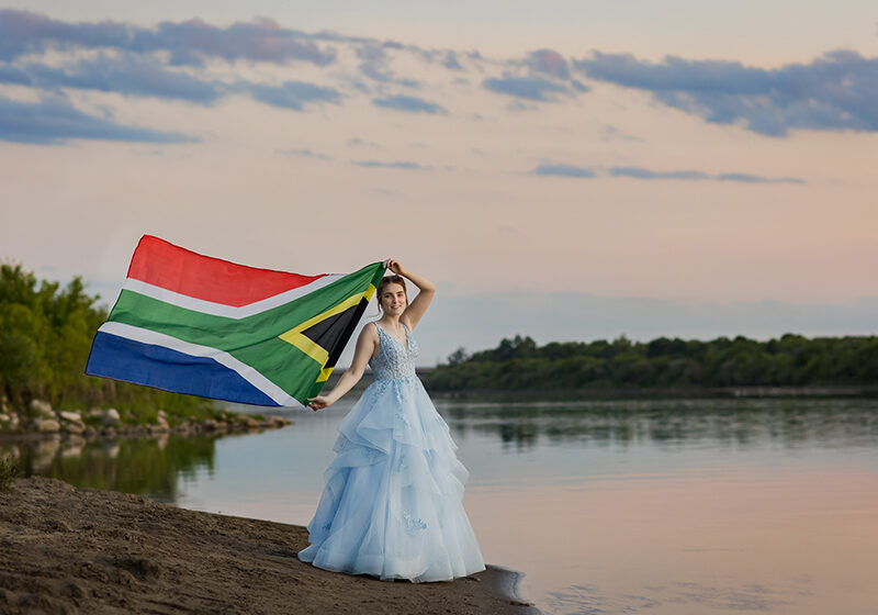 Grad photos with the South African flag.